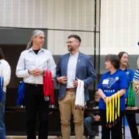 Louie and others holding medals